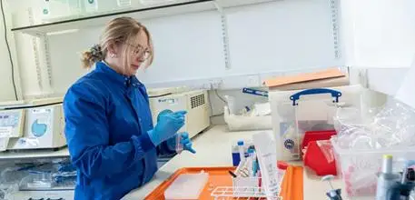 Anastasia working in a laboratory