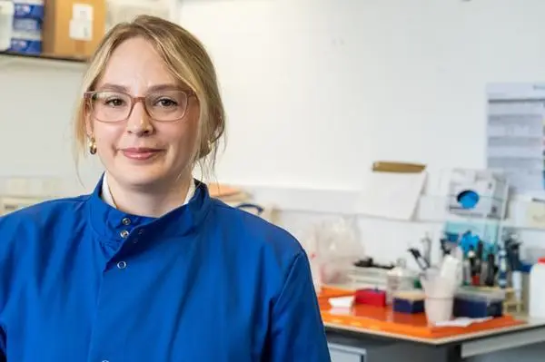 Anastasia smiling at the camera