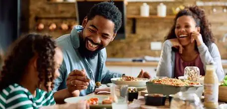 A family eating a healthy dinner together
