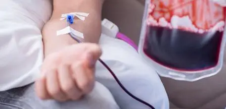 Someone receiving a blood transfusion