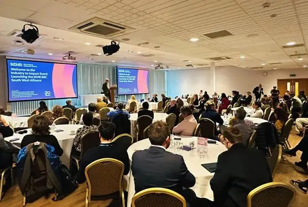 People at tables attending the BRC South West Alliance launch event