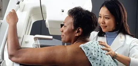 Woman having a mammogram scan