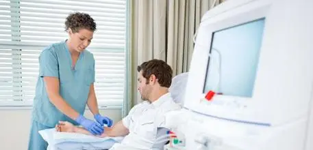 Patient with cancer being treated by a nurse 