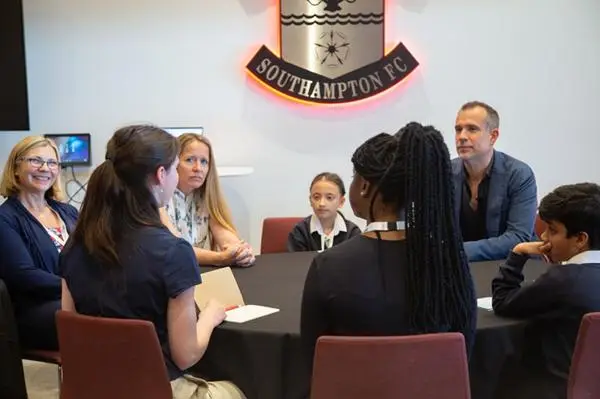 The group sat around a table talking