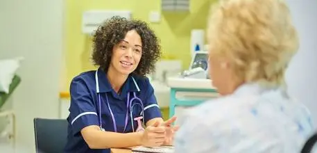 Doctor talking to patient