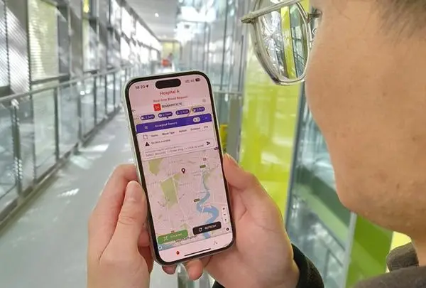 The blood donation app, shown on a phone screen