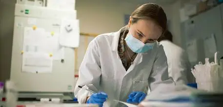 Lab worker in mask