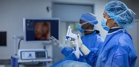 Surgeons operating