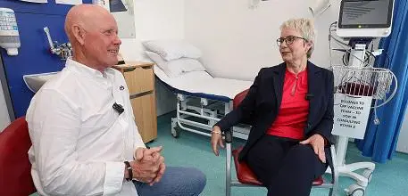 Paul Thomas with Government minister Karin Smyth