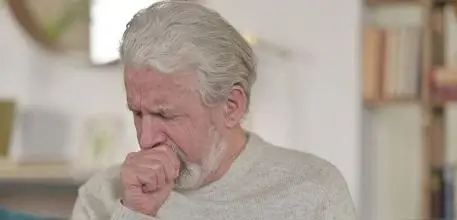 Man coughing