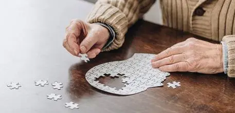Old person doing puzzle