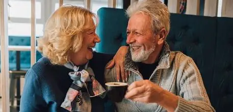 Older couple having coffee