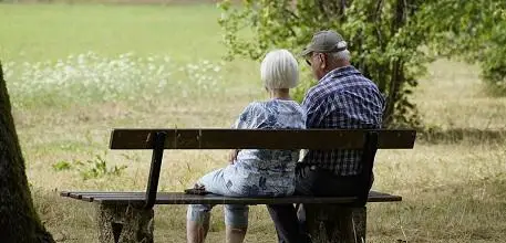 Elderly couple on bench