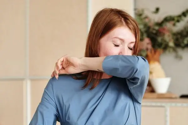 A woman coughing