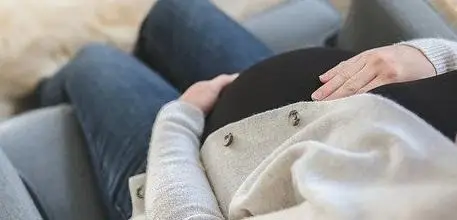Pregnant woman at home