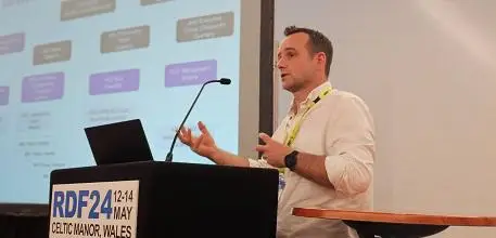 Chris Stock speaking at the conference