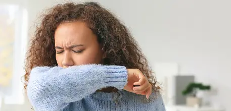 Woman coughing