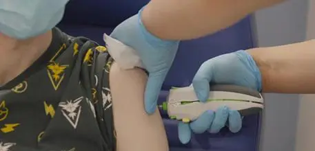The trial vaccine being delivered using a needle-free device