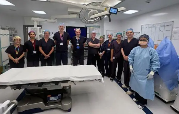 Urology Paediatric robotic surgical team with surgeon Ewan Brownlee, 4th from left